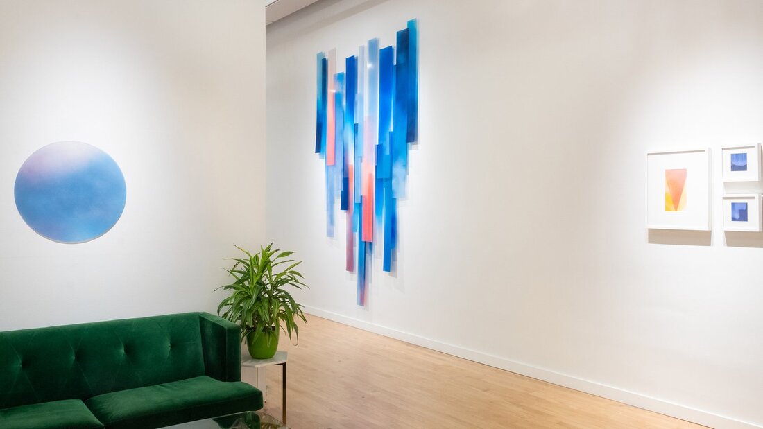 photo of colorful artwork in a gallery